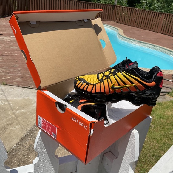 Nike Shoes - Nike Black and Orange Sneakers with Air Max Cushioning